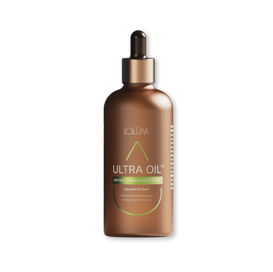 Braune Glasflasche mit Pipette, Aufschrift „LOLUM ULTRA OIL – Antibacterial & Antiseptic“. Pflanzenölmischung für gereizte, unreine oder pilzempfindliche Haut.