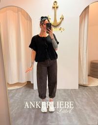 leah bow | black vest