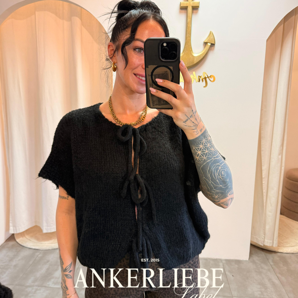 leah bow | black vest