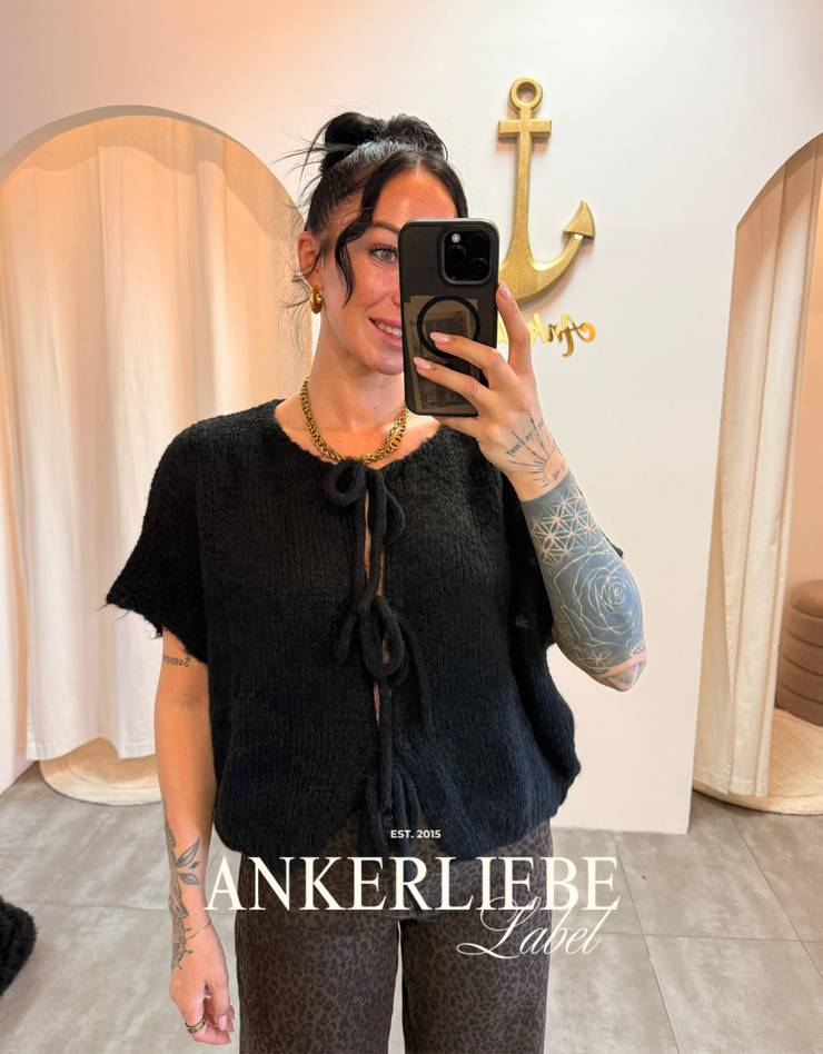 leah bow | black vest