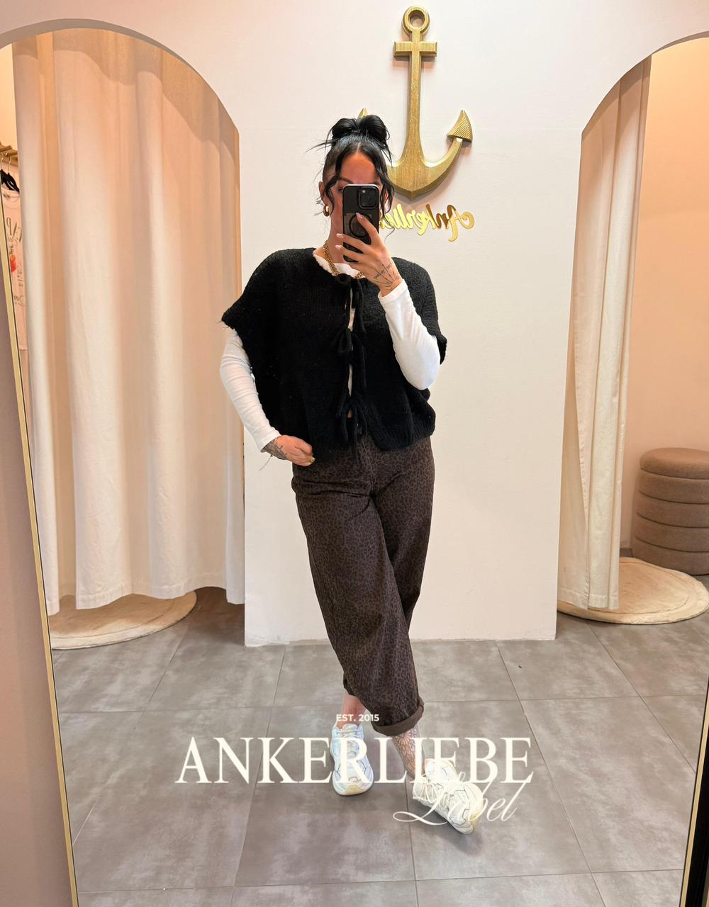 leah bow | black vest