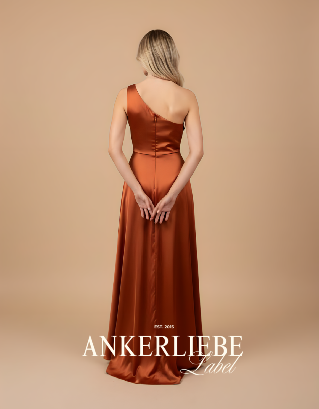 image abendkleid mit one-shoulder ausschnitt und fließendem rock | rost