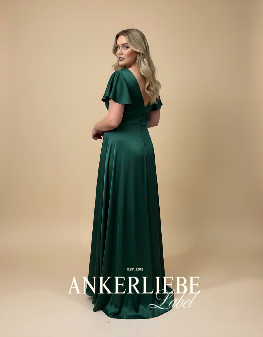 image abendkleid mit v-ausschnitt, beinschlitz und weiten ärmeln | smaragd - QS