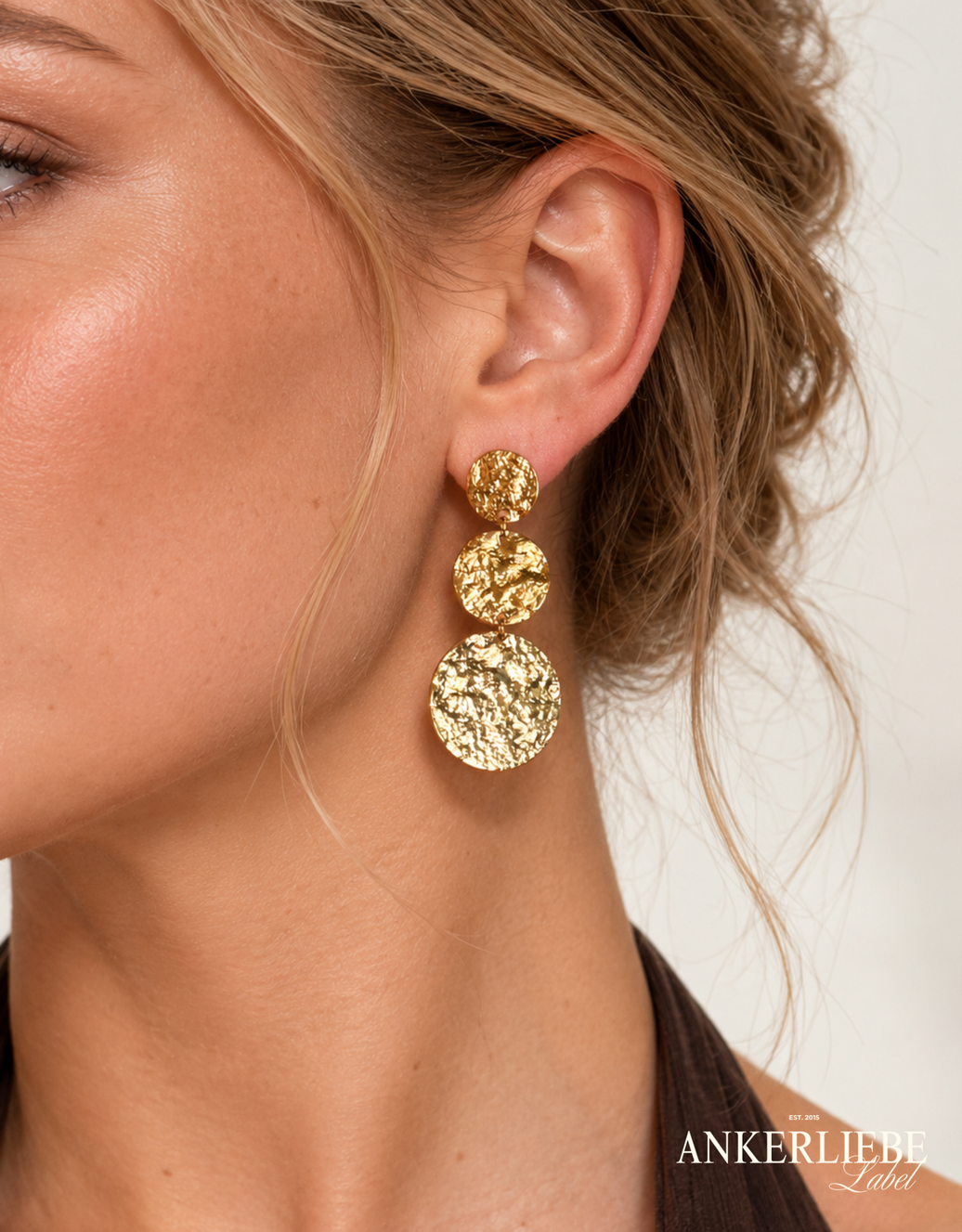 elegante statement ohrringe mit struktur | gold