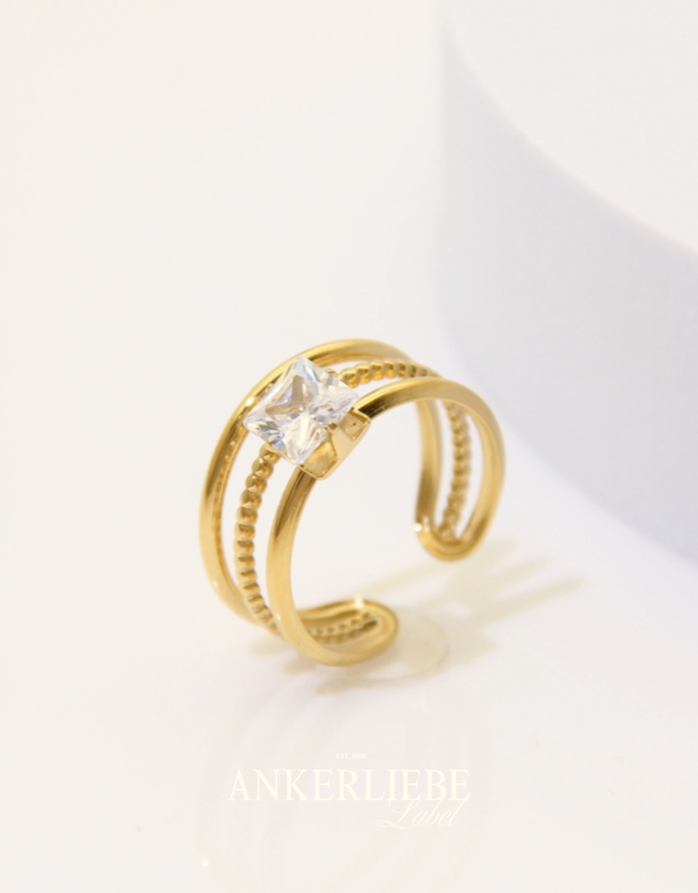 multi-ring mit quadratischem glitzerstein