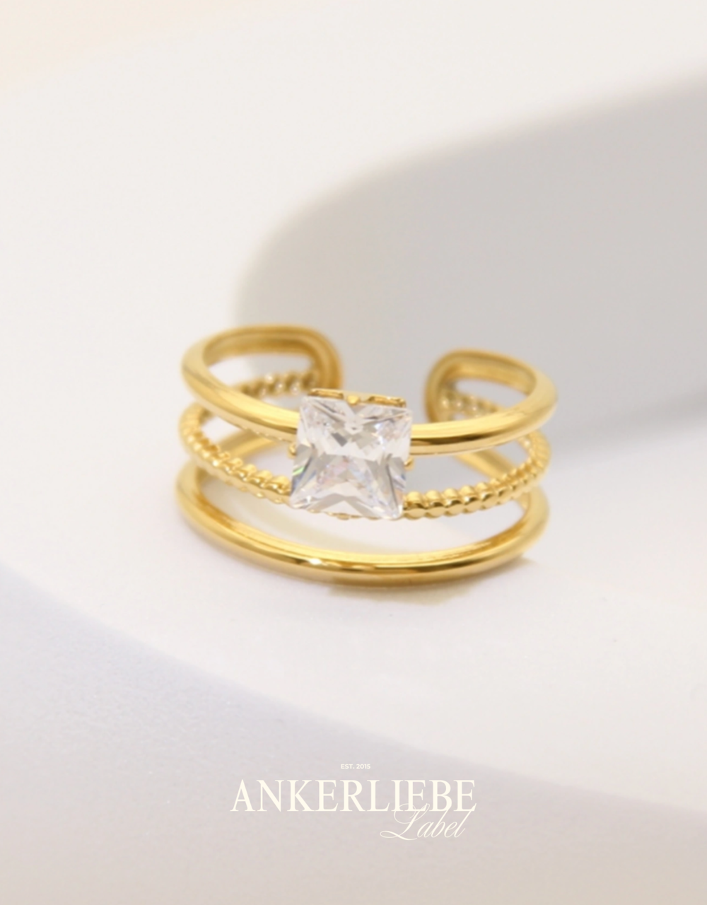 multi-ring mit quadratischem glitzerstein