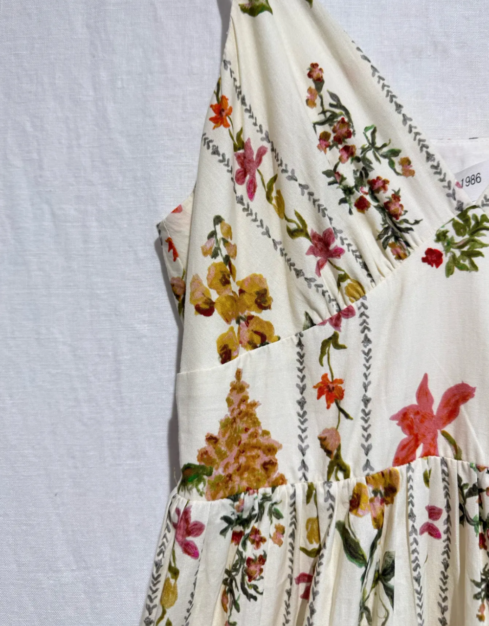 geblümtes Maxikleid mit Volants und Spaghettiträgern | cremeweiß